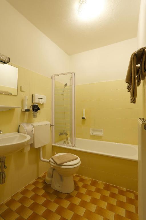 Koupelna v ubytování Alpen.Adria.Stadthotel