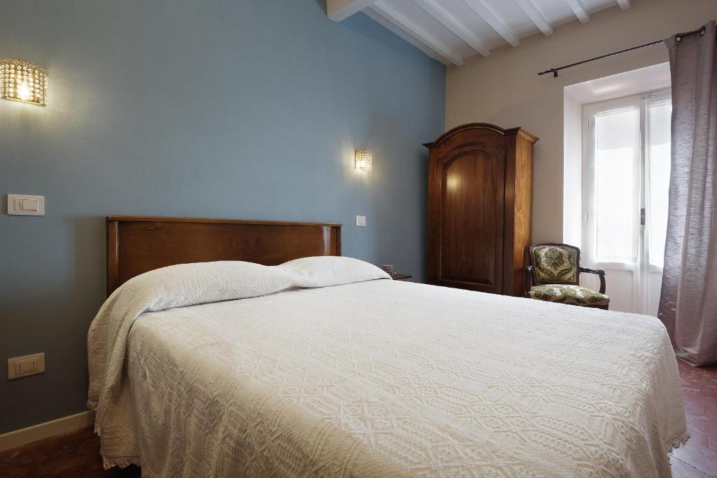 Postel nebo postele na pokoji v ubytování La Bellavita B&B