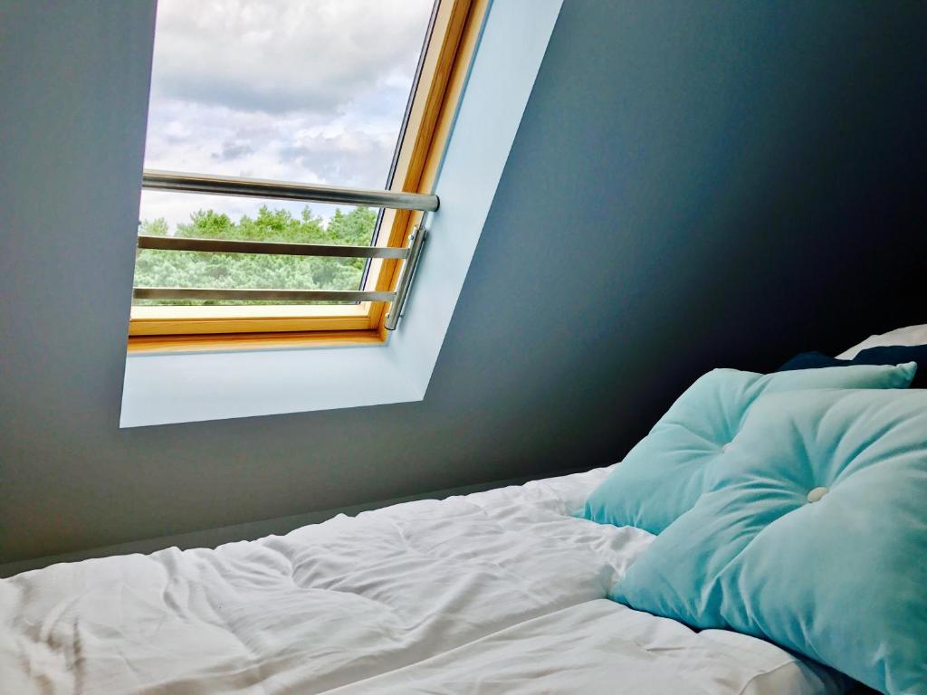 Łóżko lub łóżka w pokoju w obiekcie Apartamenty Platinum