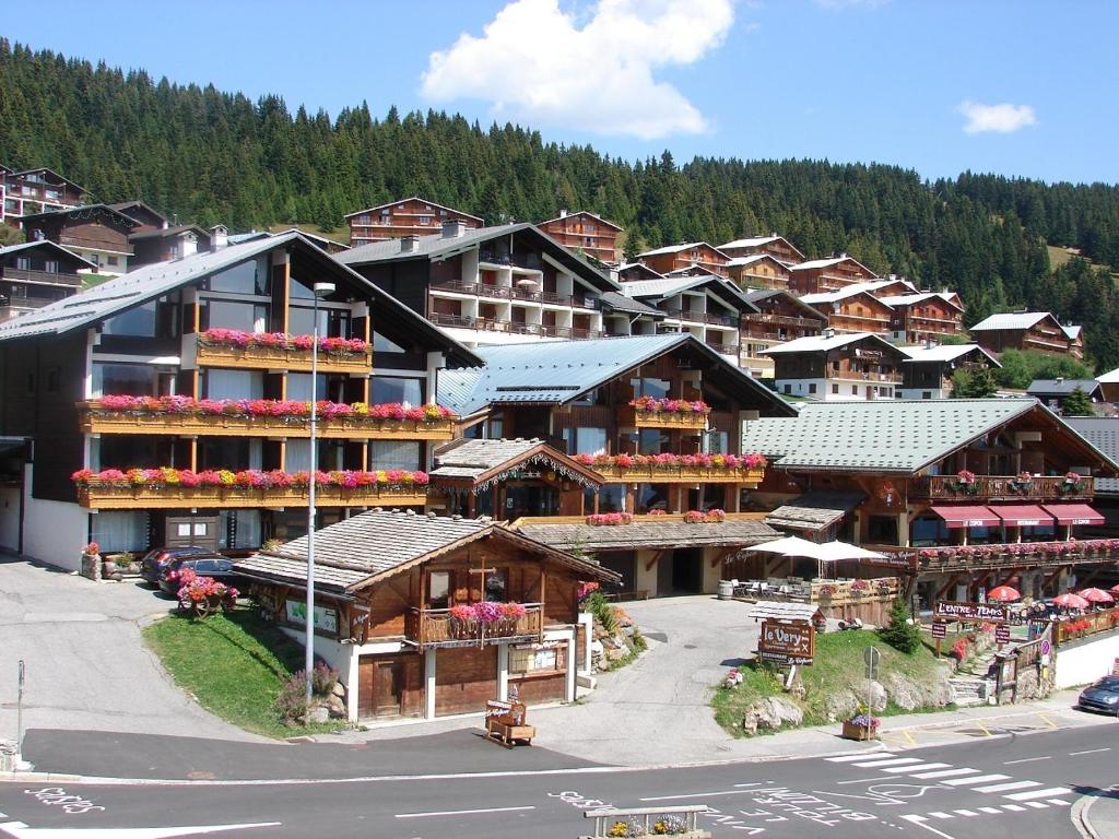 an aerial view of a resort with buildings at Hôtel Le Very in Les Saisies