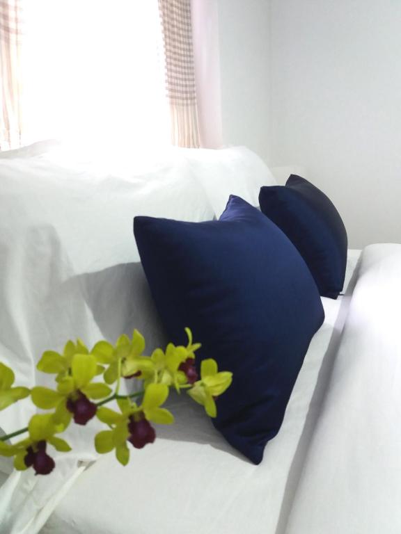 Postel nebo postele na pokoji v ubytování ANGKOR DINO B&B