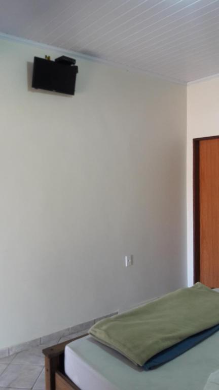 Postel nebo postele na pokoji v ubytování Chalé da Selma I (Isaías)