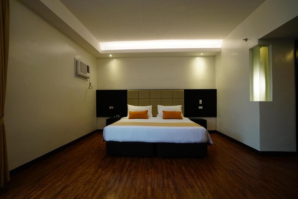 Postel nebo postele na pokoji v ubytování Hotel Oazis