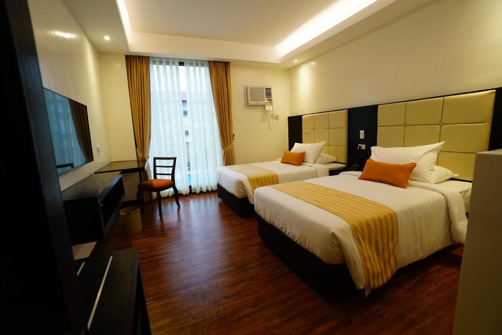 TV a/nebo společenská místnost v ubytování Hotel Oazis
