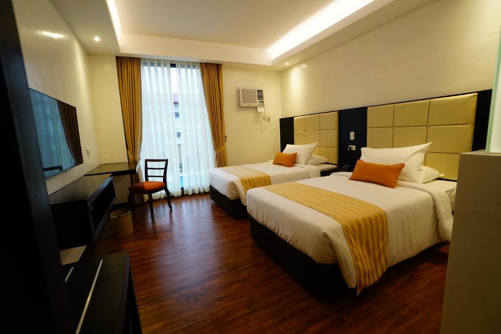 TV a/nebo společenská místnost v ubytování Hotel Oazis