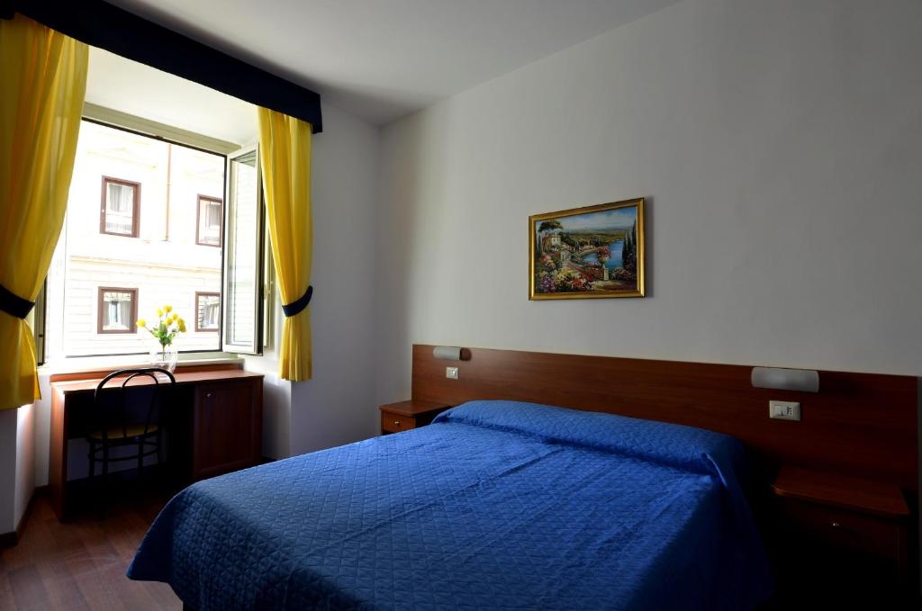 Postel nebo postele na pokoji v ubytování Hotel Tex