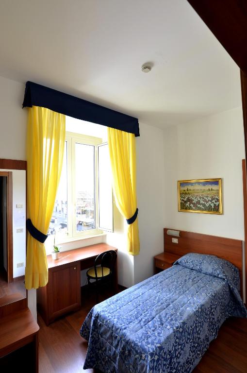 Postel nebo postele na pokoji v ubytování Hotel Tex