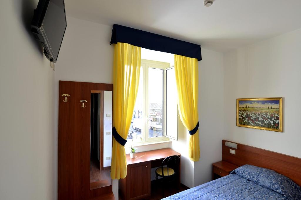 Postel nebo postele na pokoji v ubytování Hotel Tex