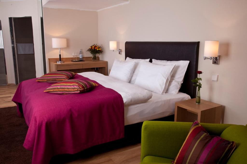 Postel nebo postele na pokoji v ubytování Hotel Palatina "Hotel-Restaurant"