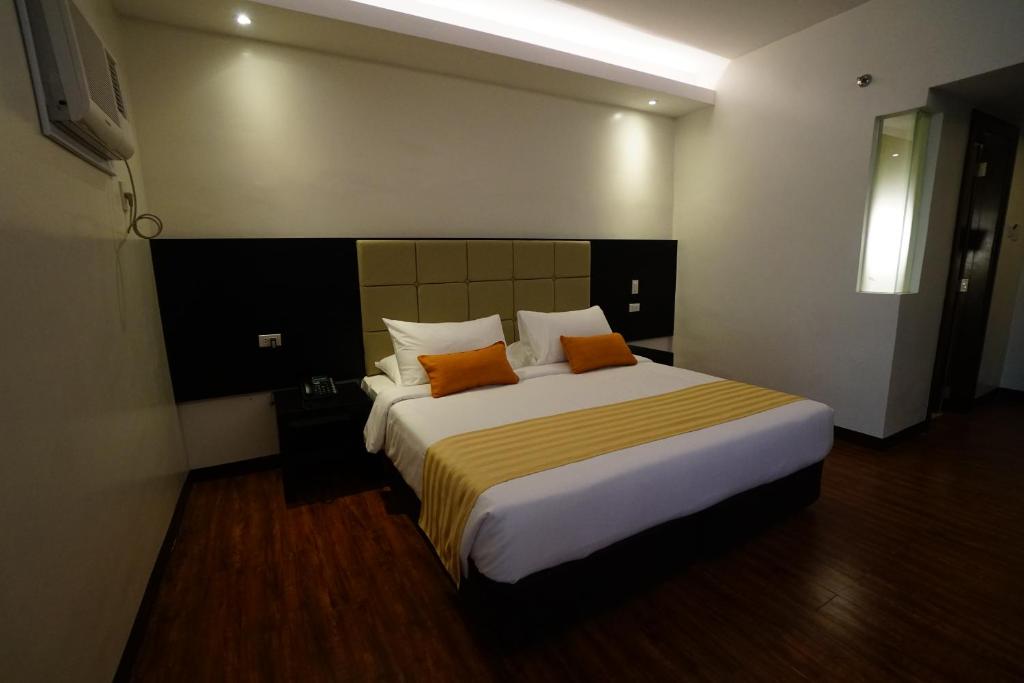 Postel nebo postele na pokoji v ubytování Hotel Oazis