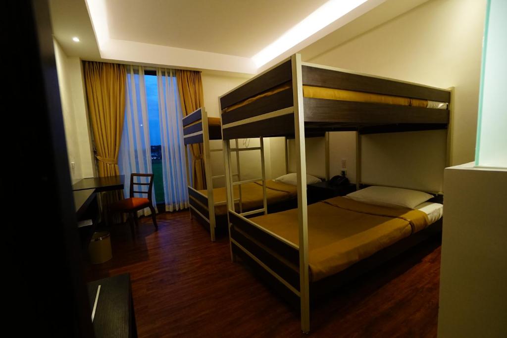 Postel nebo postele na pokoji v ubytování Hotel Oazis