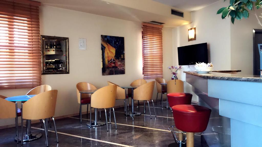 TV a/nebo společenská místnost v ubytování Hotel Maxim