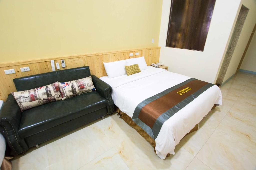 Postel nebo postele na pokoji v ubytování Emilia Resort I