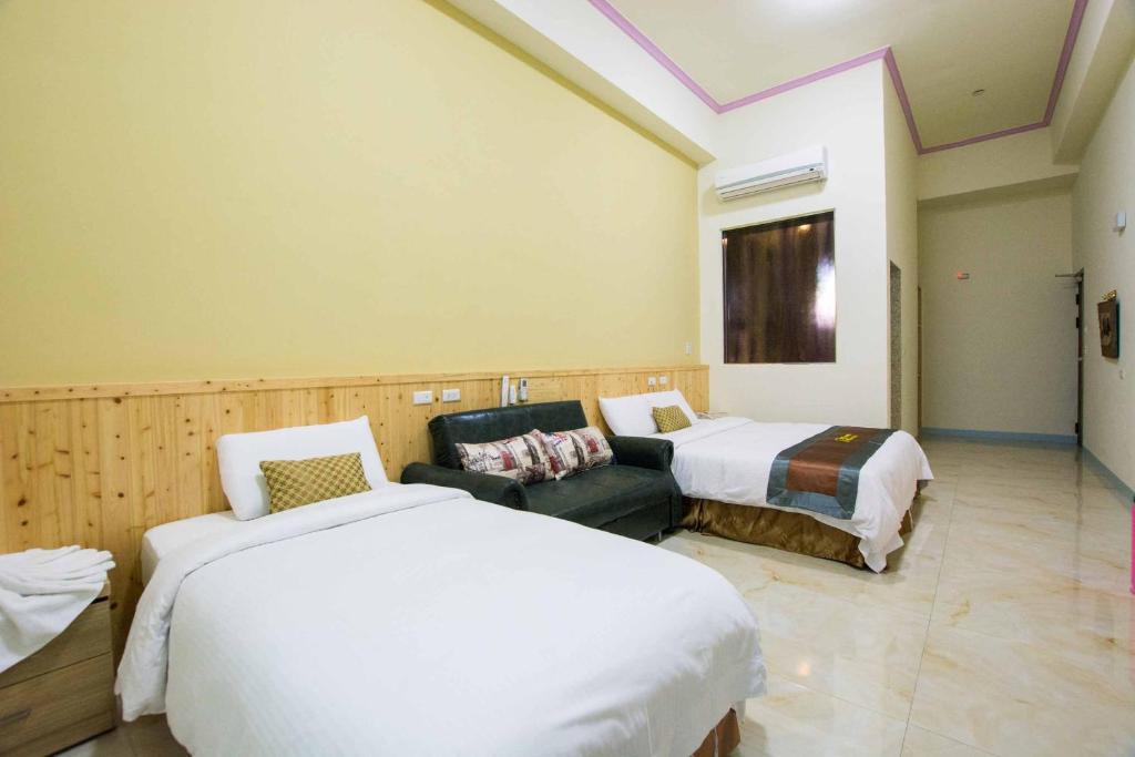 Postel nebo postele na pokoji v ubytování Emilia Resort I