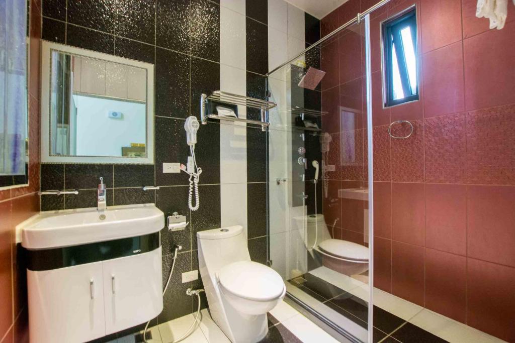 Koupelna v ubytování Emilia Resort I