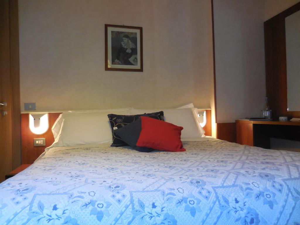 Postel nebo postele na pokoji v ubytování Pensione Genzianella