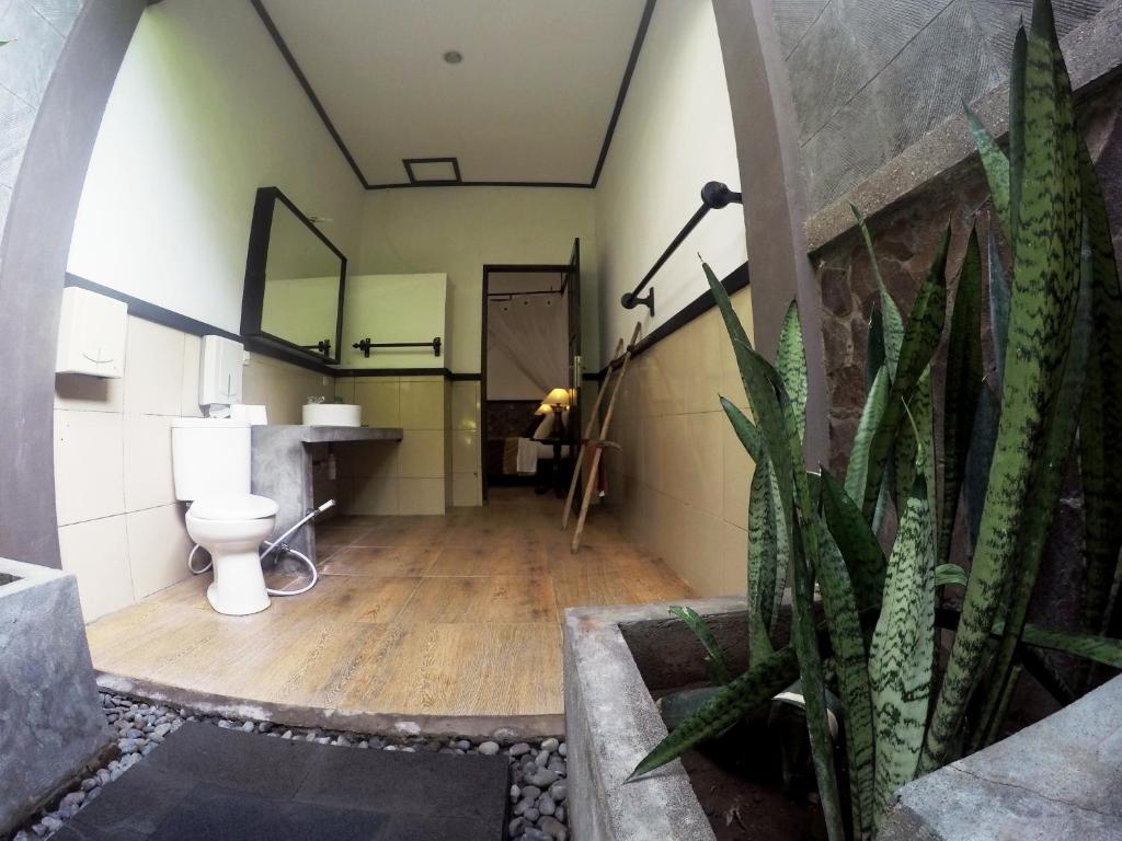 Koupelna v ubytování Doubleyou Homestay Pemuteran