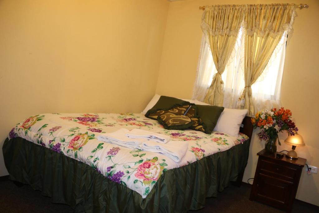 Postel nebo postele na pokoji v ubytování Hotel Residencial El Viajero