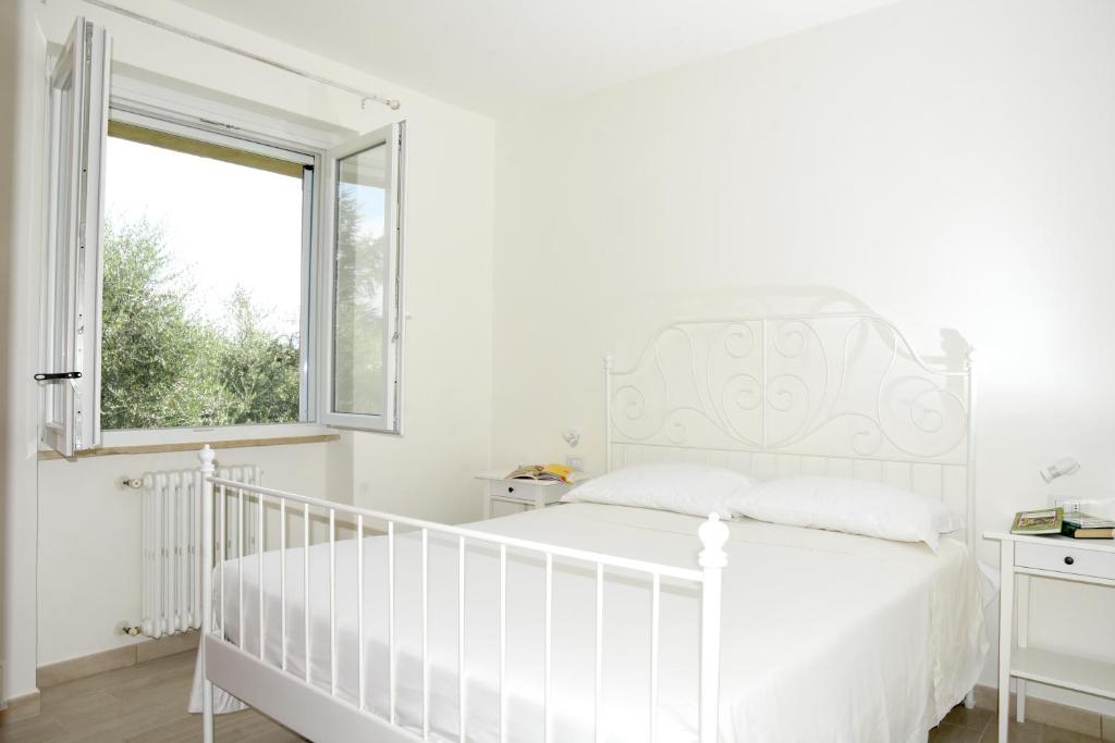 A bed or beds in a room at Bio Forester