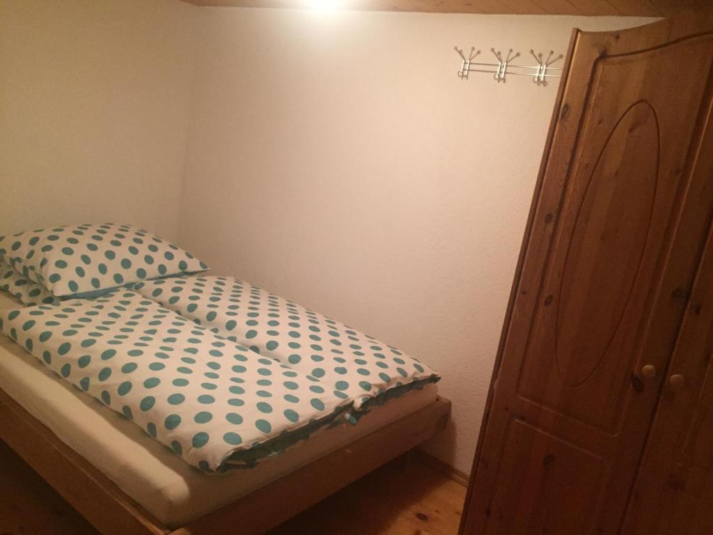Posteľ alebo postele v izbe v ubytovaní Sunnaschi Appartements - Wohnungen oder gesamt als "Hütte"