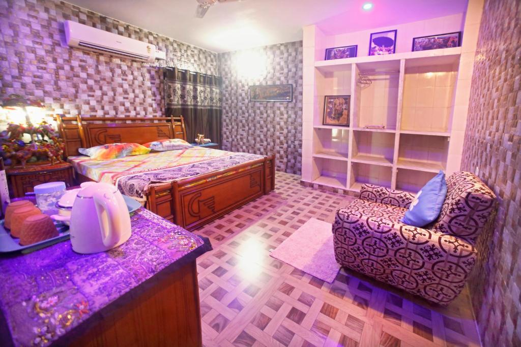 Postel nebo postele na pokoji v ubytování Pushkar Cooking Art and Home Stay