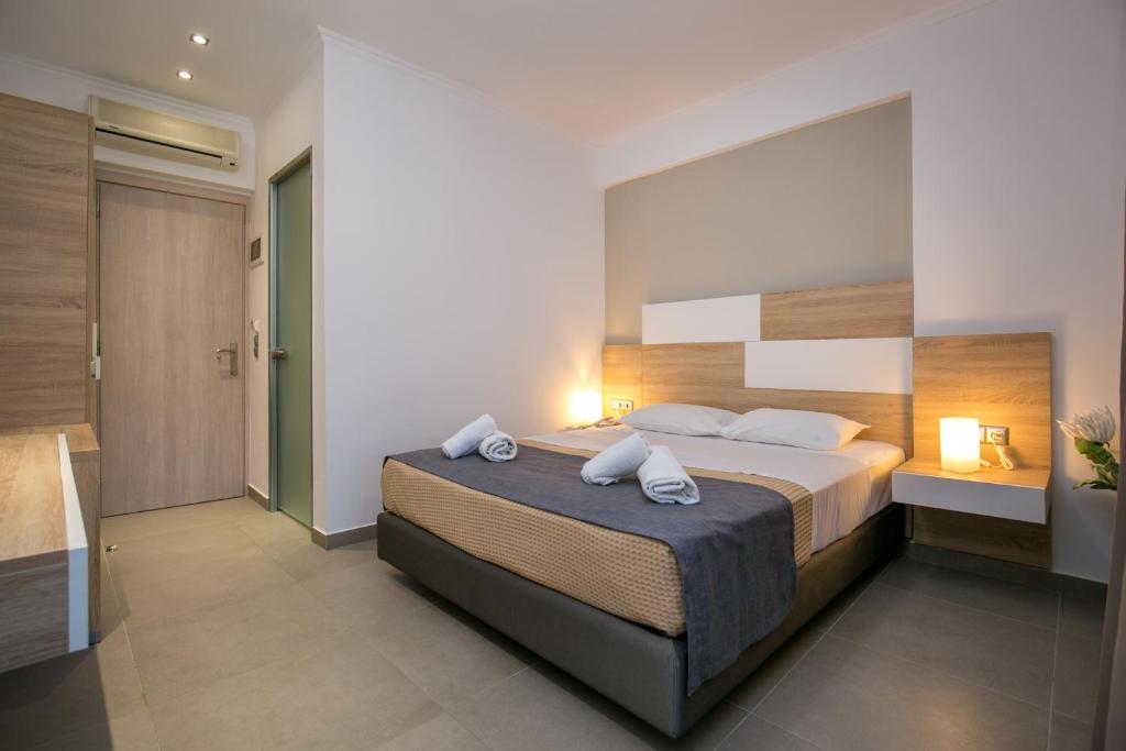 Postel nebo postele na pokoji v ubytování Astris Sun Hotel