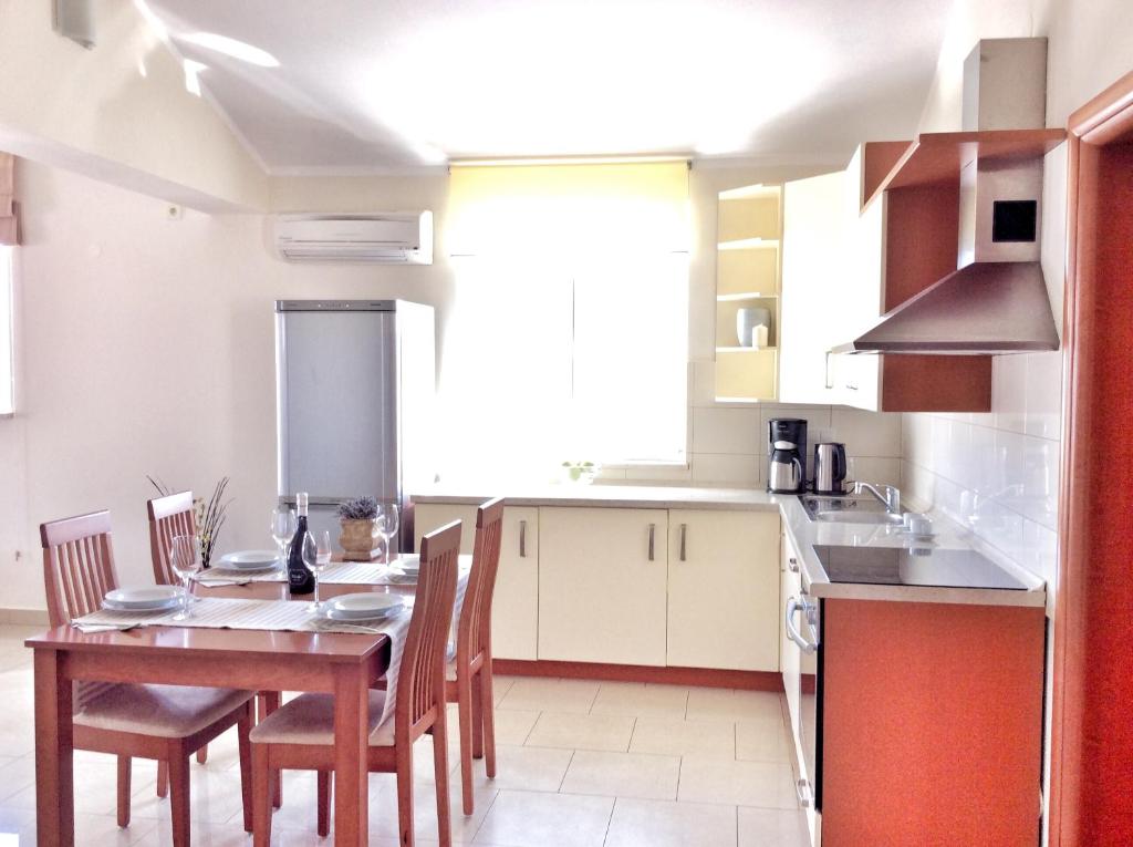 Kuchyň nebo kuchyňský kout v ubytování Apartments Kovacic