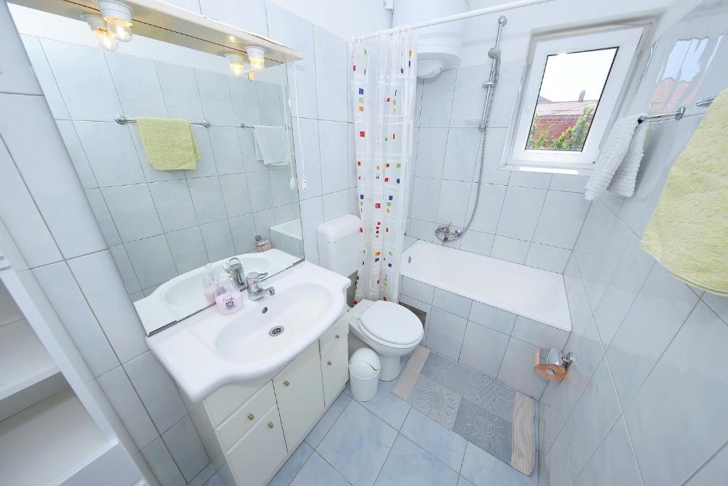 Koupelna v ubytování Punta Preko Apartments