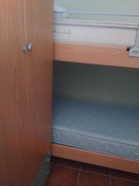 A bed or beds in a room at Regina di cuori