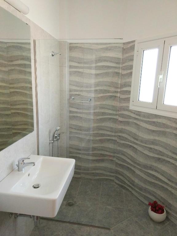 Kúpeľňa v ubytovaní Melissa Apartments, Studios & Suites