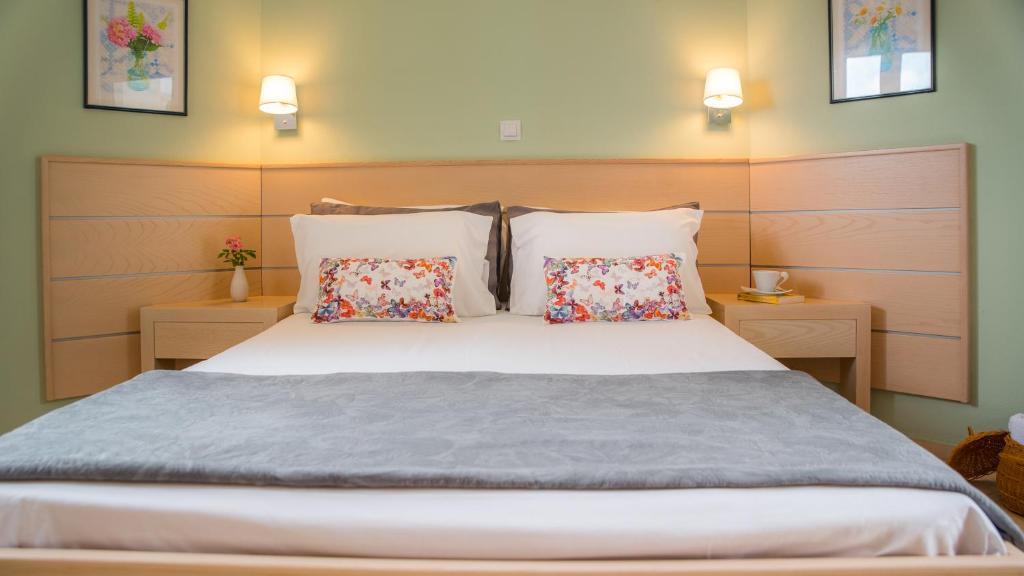 Posteľ alebo postele v izbe v ubytovaní Melissa Apartments, Studios & Suites