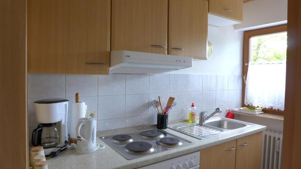 Kuchyň nebo kuchyňský kout v ubytování Hummelshof