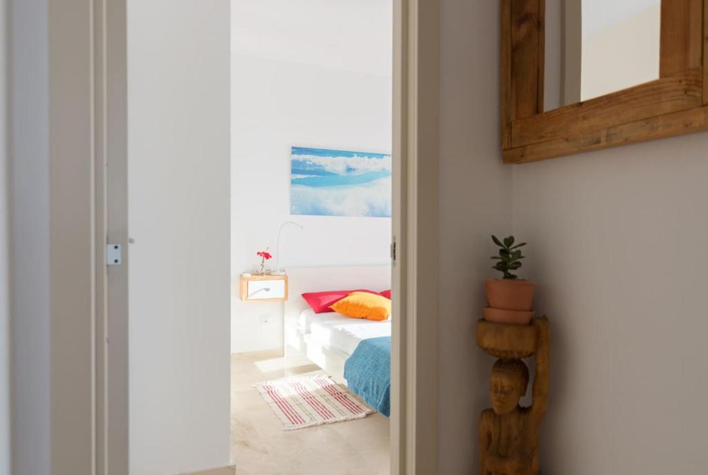 Posteľ alebo postele v izbe v ubytovaní Apartamento Sietecolores Sea View