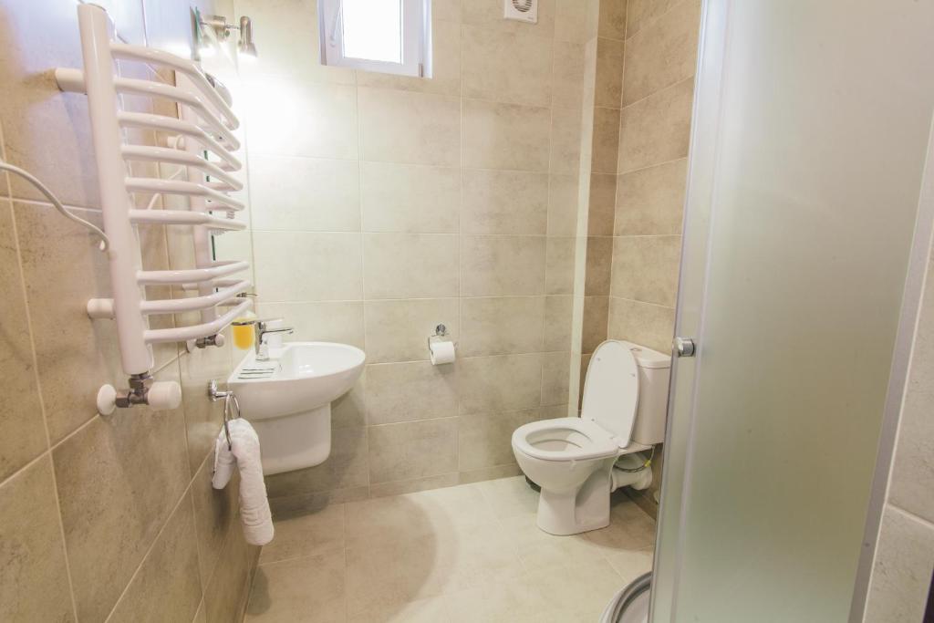 Koupelna v ubytování Zinedine Sport-Hotel