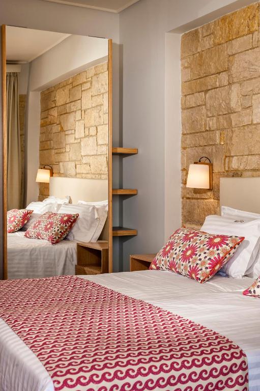 A bed or beds in a room at Eland Dream Villas