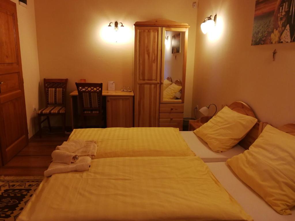 Postel nebo postele na pokoji v ubytování Vitis Vendégház