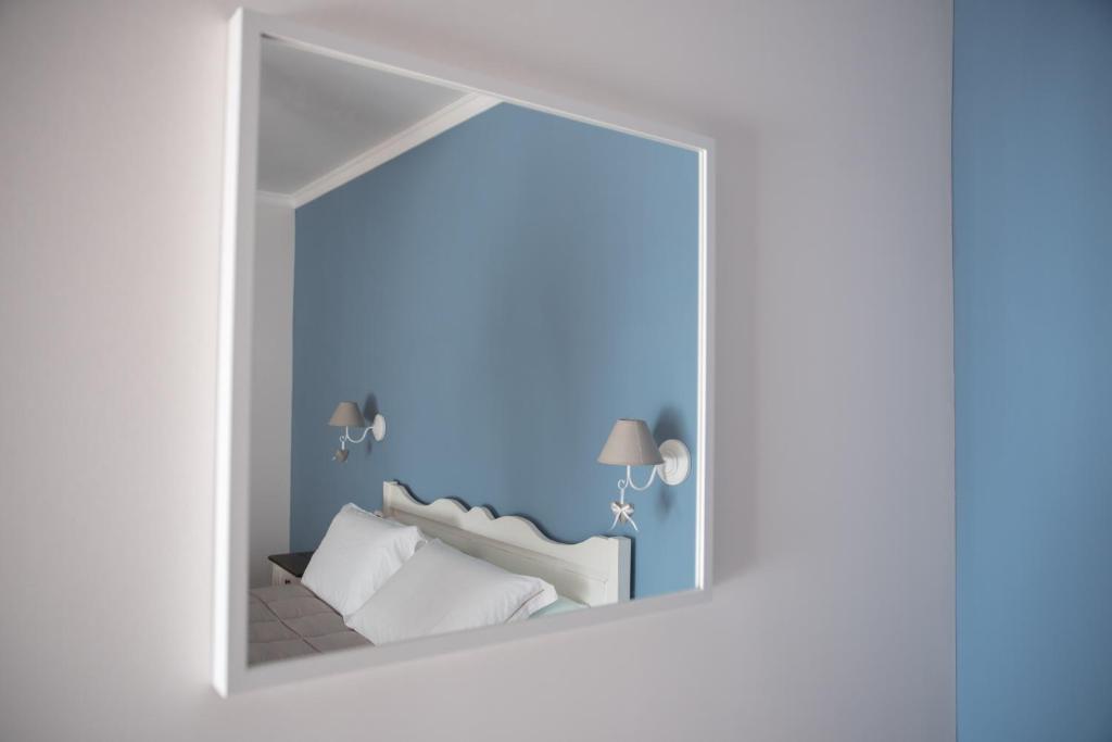 Postel nebo postele na pokoji v ubytování Anima Antiqua Relais & Spa