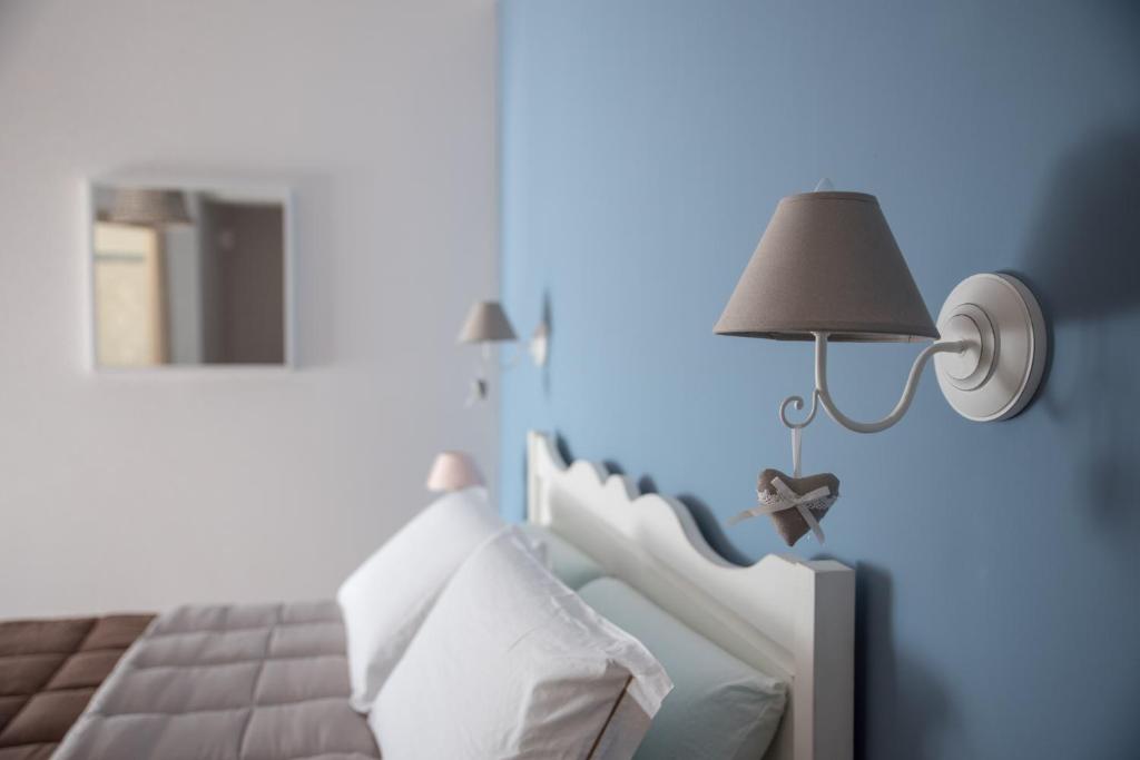 Postel nebo postele na pokoji v ubytování Anima Antiqua Relais & Spa