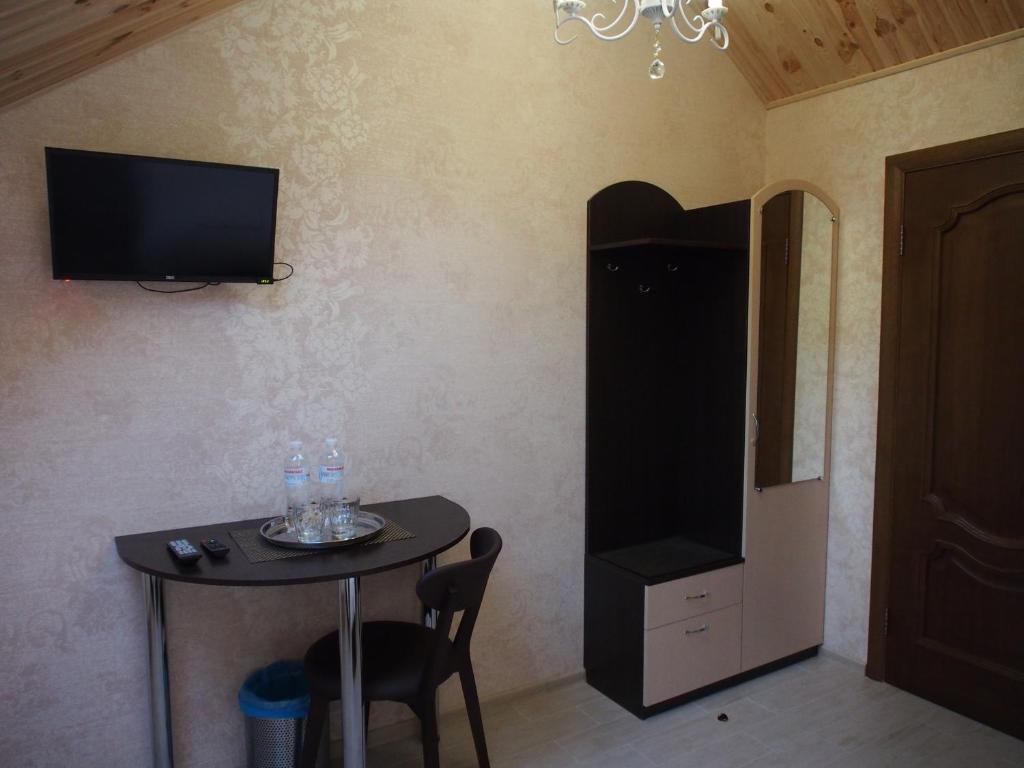 TV a/nebo společenská místnost v ubytování Kolmark Residence