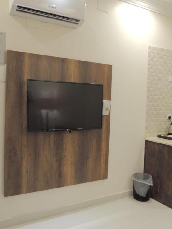 TV a/nebo společenská místnost v ubytování Golden Square