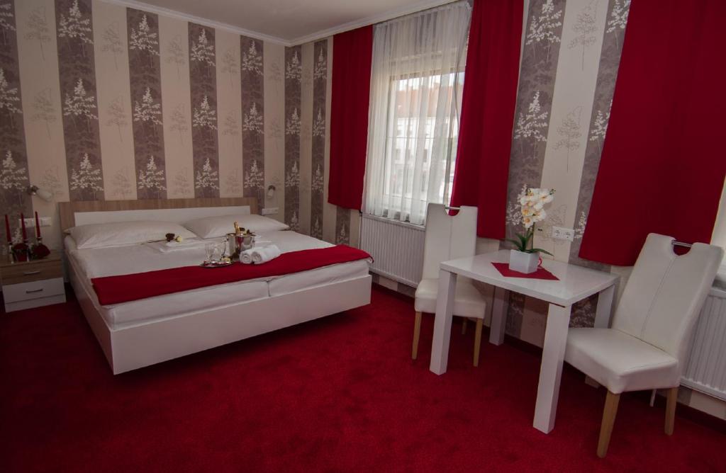 Postel nebo postele na pokoji v ubytování Hotel Restaurant Stöckl