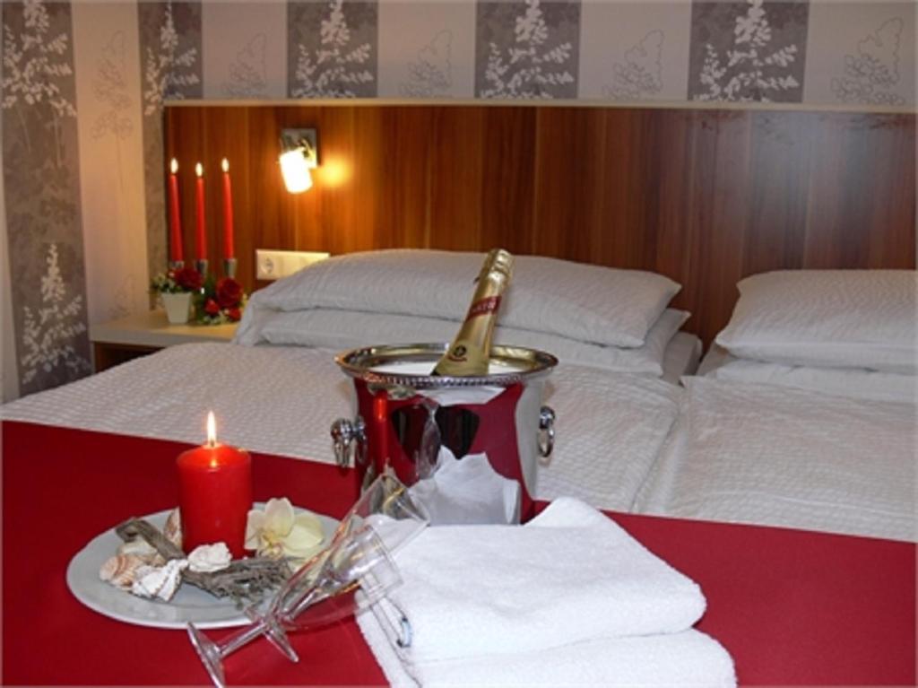 Postel nebo postele na pokoji v ubytování Hotel Restaurant Stöckl