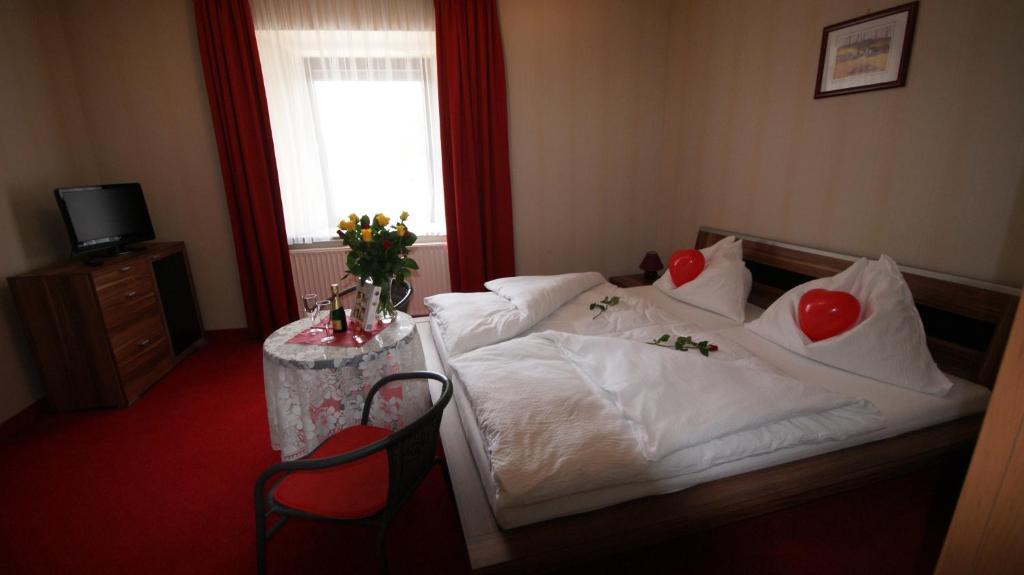 Postel nebo postele na pokoji v ubytování Hotel Restaurant Stöckl
