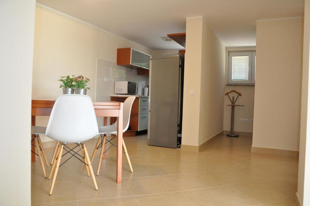 Kuchyň nebo kuchyňský kout v ubytování Villa Ulivo Apartments