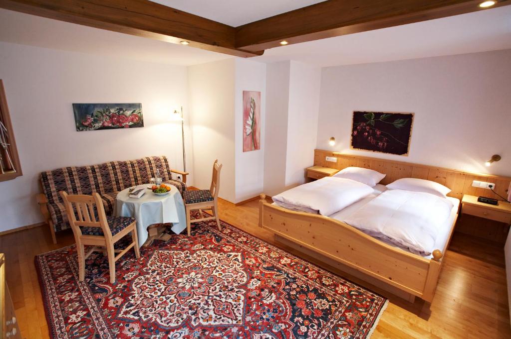 Postel nebo postele na pokoji v ubytování Hotel Oberschmied