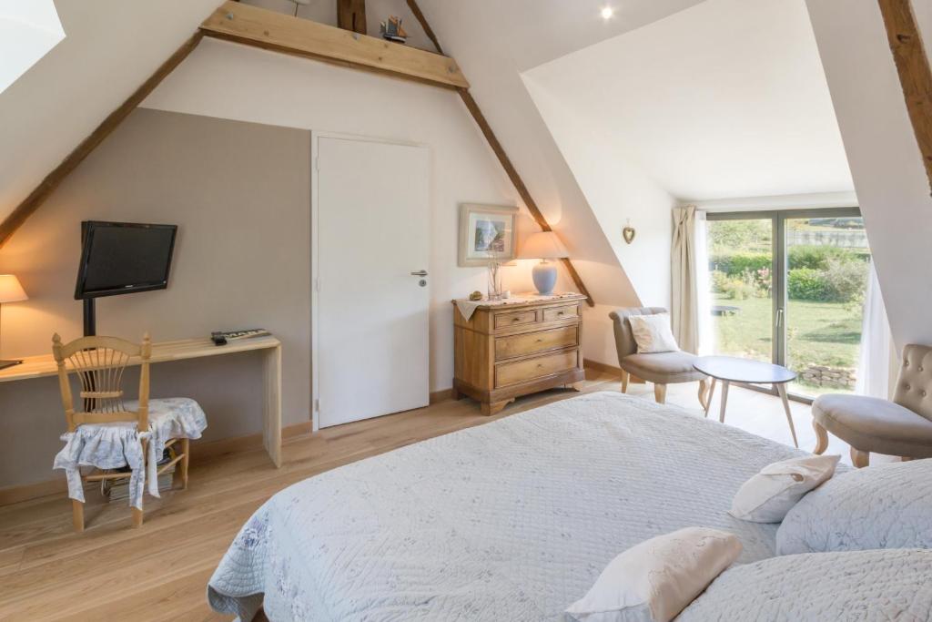 Postel nebo postele na pokoji v ubytování La chambre du Grand Val