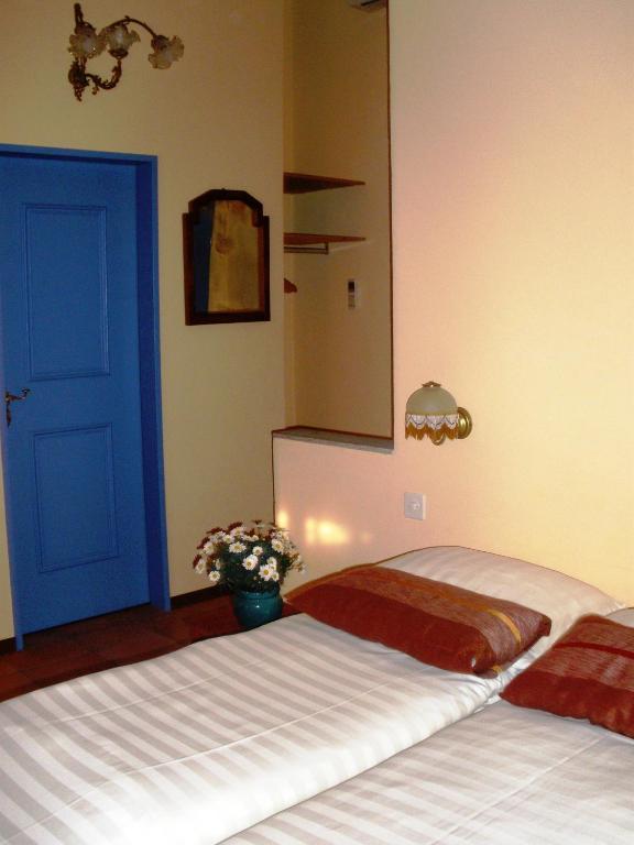Postel nebo postele na pokoji v ubytování Casa Gialla B&B