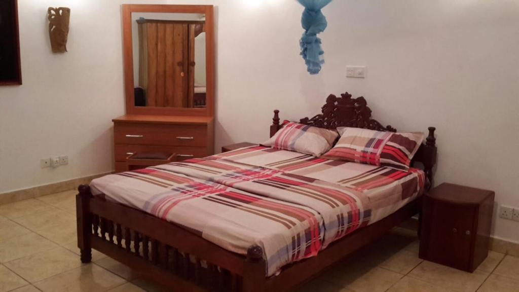 Postel nebo postele na pokoji v ubytování Haus am Meer "Wilde Ananas"