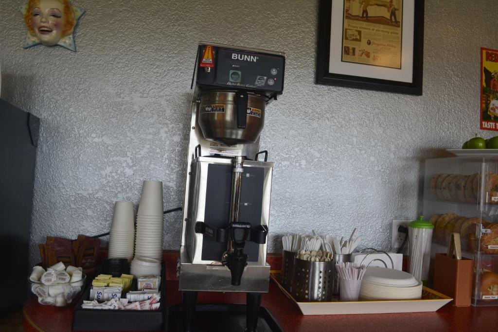 a coffee machine sitting on top of a table at Retro Inn at Mesa Verde in Cortez