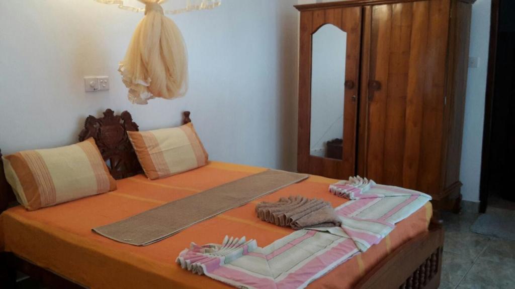Postel nebo postele na pokoji v ubytování Haus am Meer "Wilde Ananas"